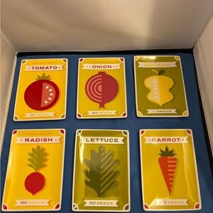 Crate and Barrel Vegetables appetizer plates. They feature bold vegetable design